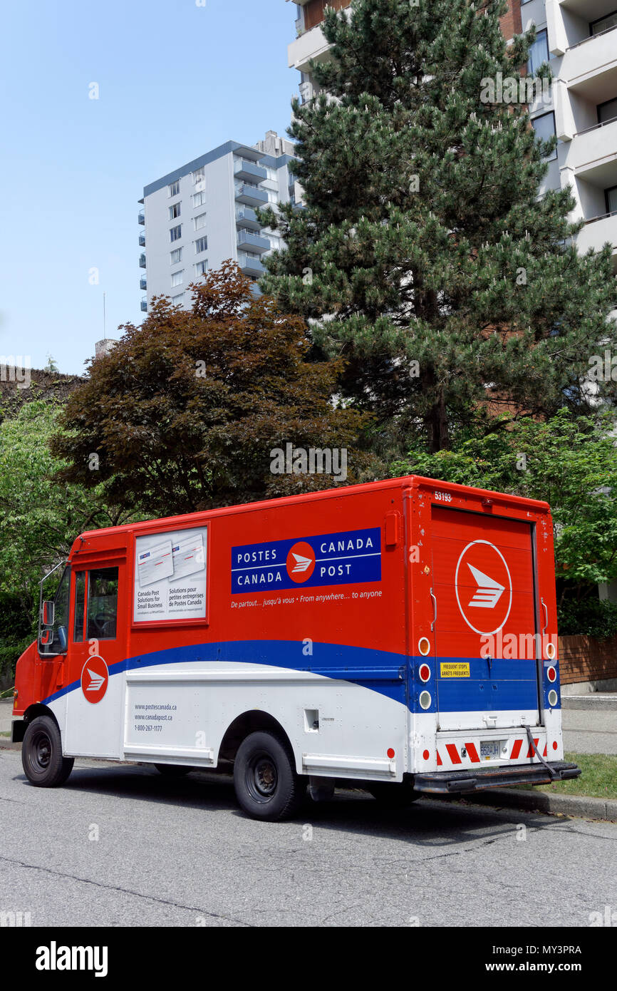 Canada Post mail delivery truck parked on a residential street in