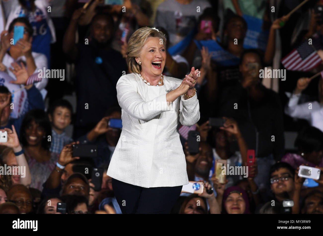 FT LAUDERDALE, FL - NOVEMBER 01: Supporters look on as Democratic presidential nominee Hillary Clinton speaks during a campaign rally at Rev Samuel Deleove Memorial Park on November 1, 2016 in Ft Lauderdale, Florida. The presidential general general election is November 8  People:  Hillary Clinton Credit: Hoo-Me.com / MediaPunch Stock Photo