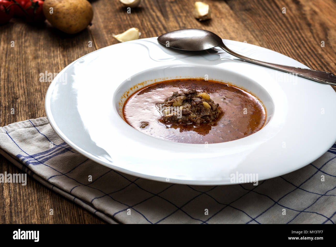 Czech goulash soup with beef meat and potatoes Stock Photo - Alamy