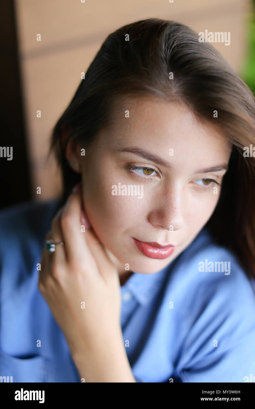 Pretty European Face Close up face of beautiful european woman with everyday makeup, wearing ...