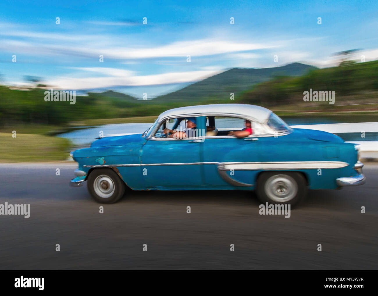Windows rolled down and out for a nice sightseeing cruise in a classic car Stock Photo Alamy