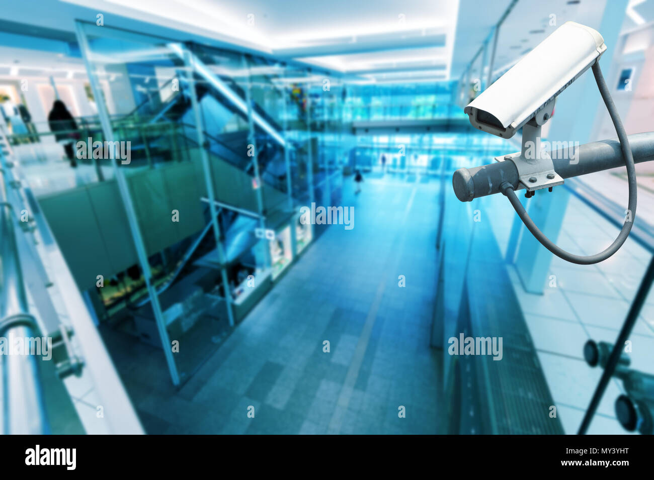 CCTV Camera or surveillance operating in building hightech blue tone ...