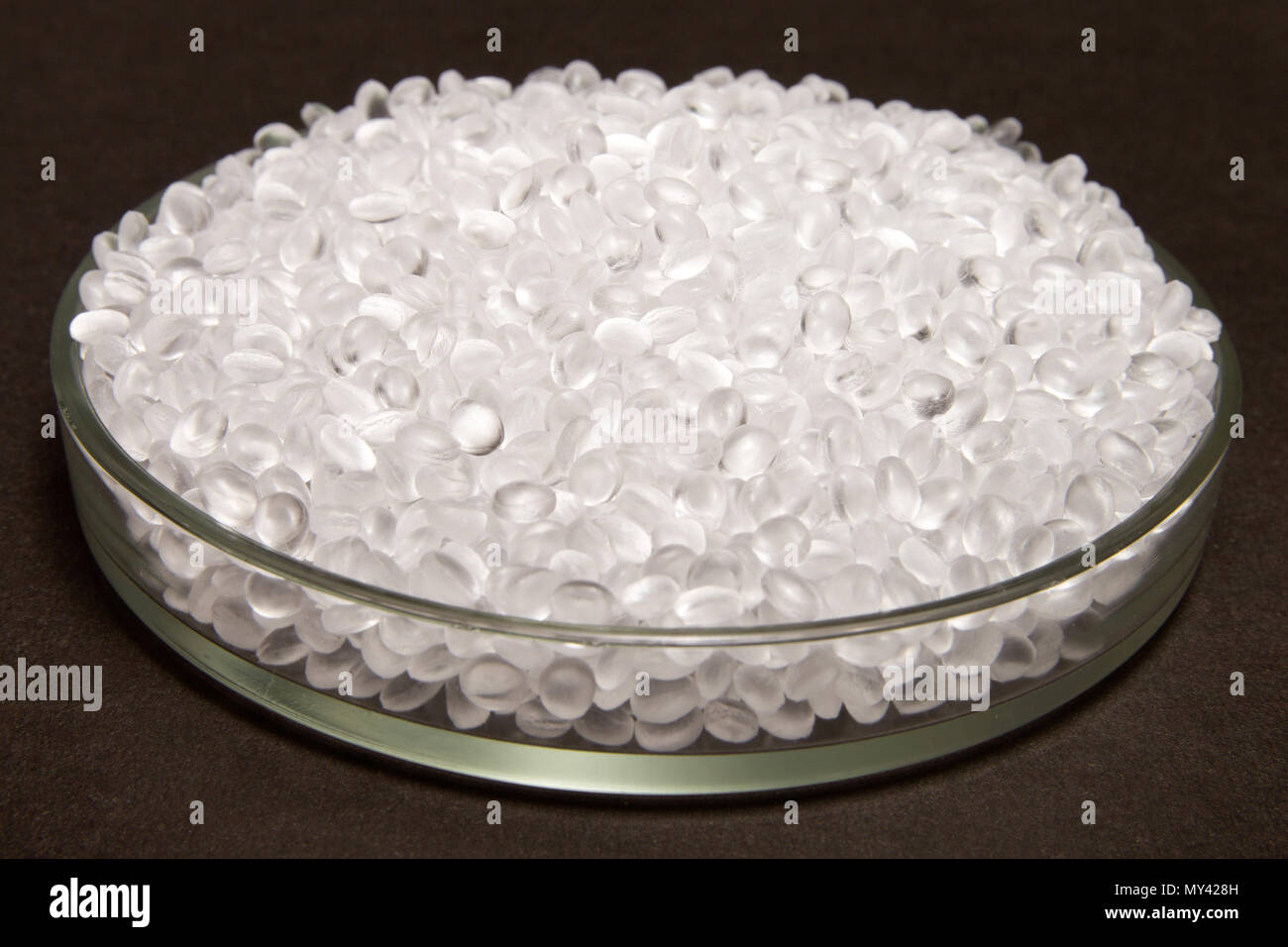 Plastic pellets. Transparent Polyethylene granules. Plastic Raw