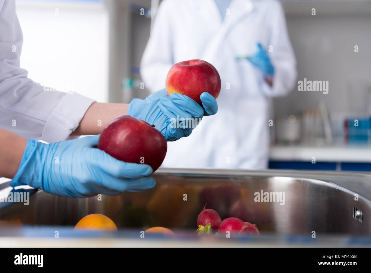 Scientists during work at modern biological laboratory Stock Photo