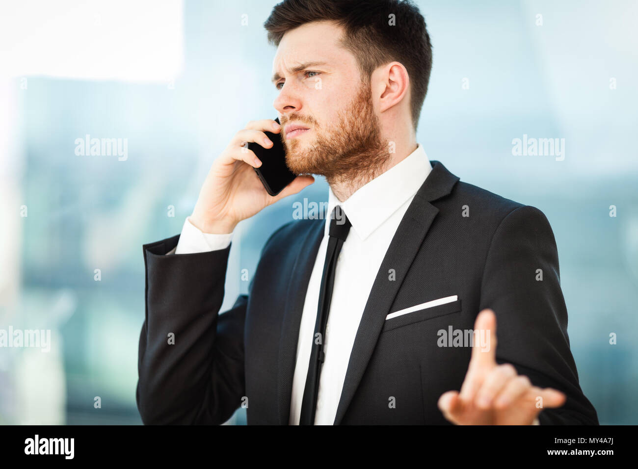 Young businessman in office Stock Photo