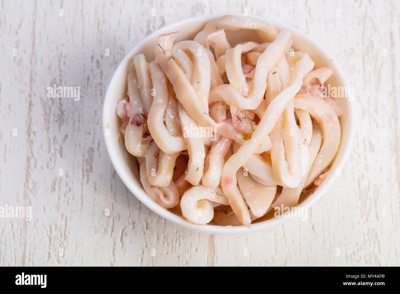 Delicious bowl of squid meat Stock Photo - Alamy