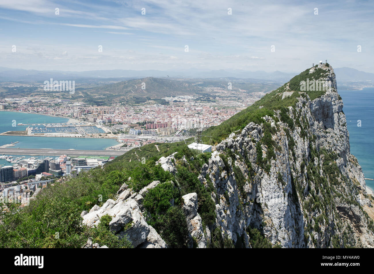 The Rock of Gibraltar and Gibraltar downtown seen from the viewing platform at the top of the cable car station Stock Photo