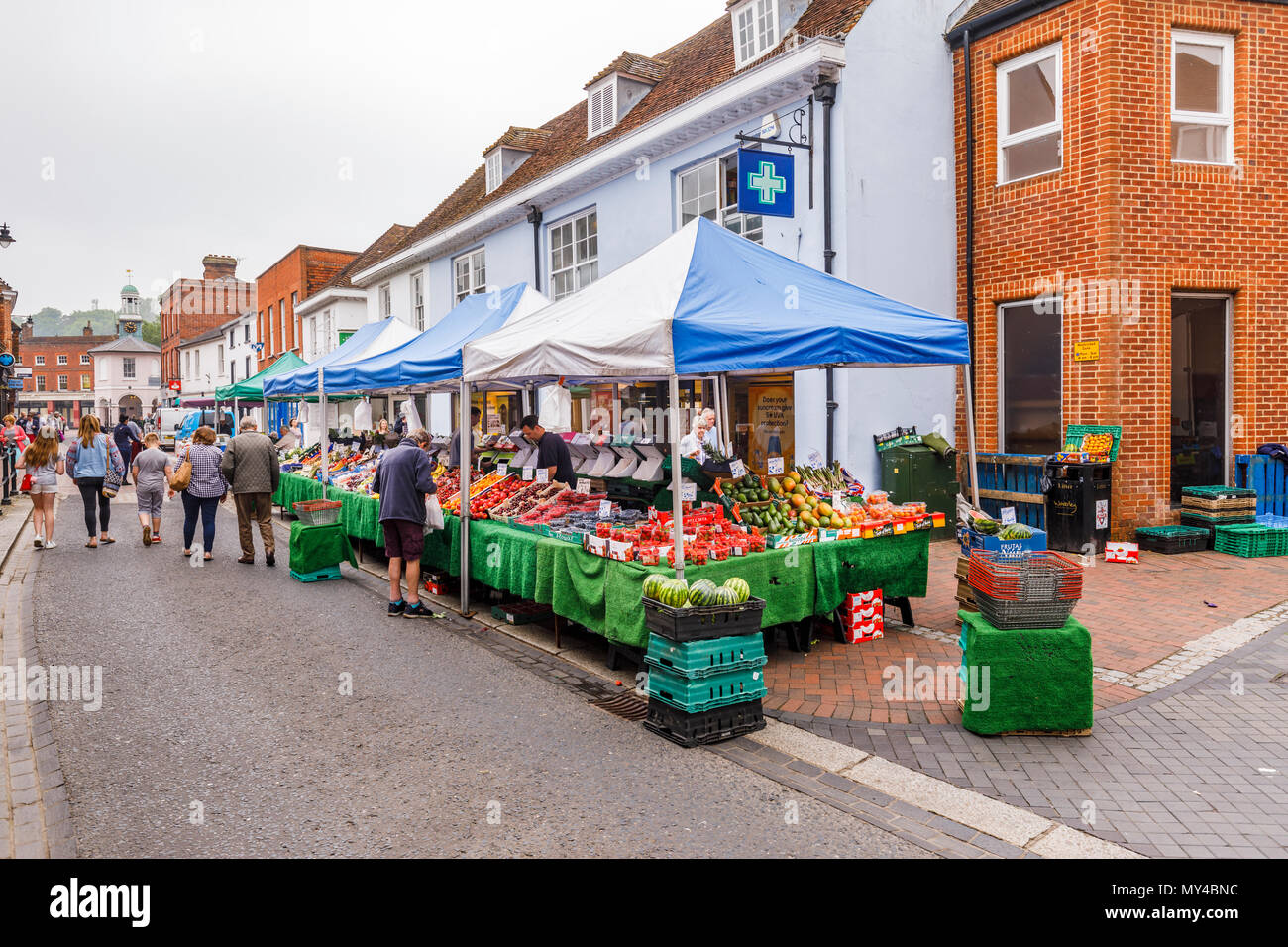 Fruit & vegetable stall in the weekend traditional farmers market in Godalming, a small historic market town near Guildford, Surrey, southeast England Stock Photo
