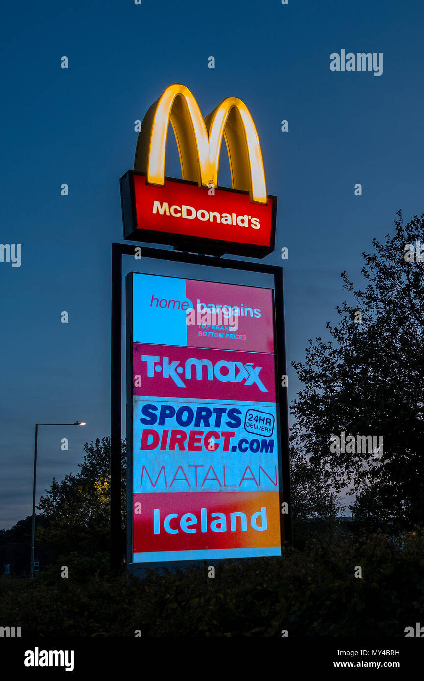 McDonalds,Home Bargains,TK Max,Sports Direct,Matalan,Iceland,Sign,Twilight,dusk Stock Photo