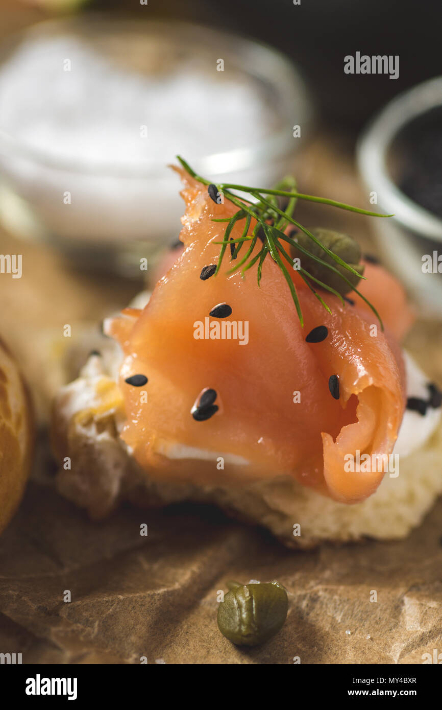 Smoked Salmon Canape Finger Food with Cream Cheese, Fresh Dill and Black Sesame Stock Photo