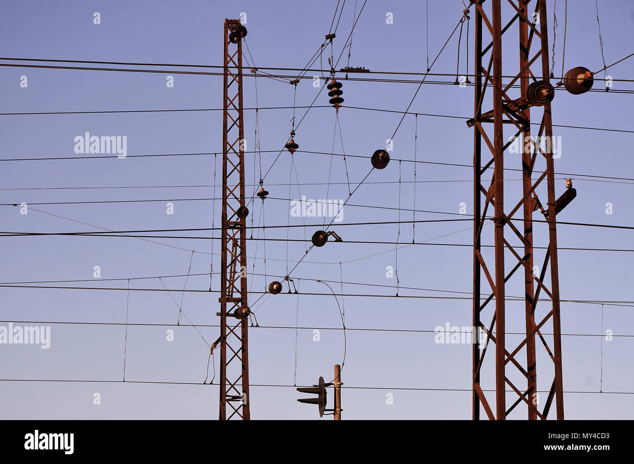 Railroad overhead lines against clear blue sky, Contact wire. High