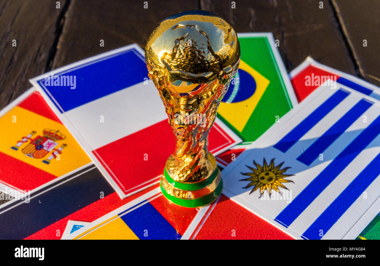 June 6, 2018 Moscow, Russia. FIFA World Cup trophy on the background of the flags of Brazil, Uruguay, France, Spain, Germany. Stock Photo