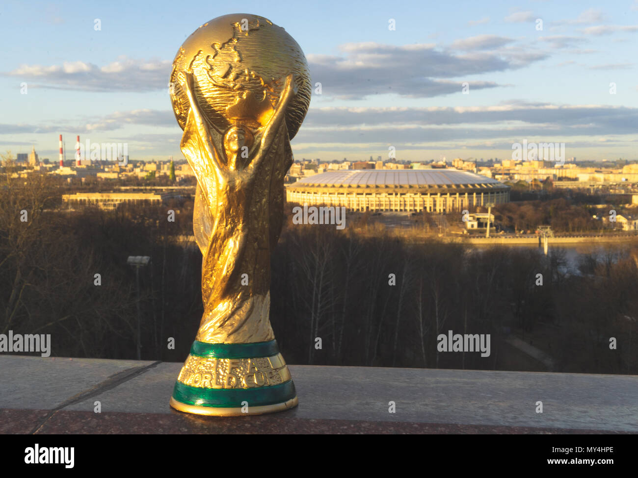 April 13, 2018 Moscow, Russia Trophy of the FIFA World Cup against the backdrop of the Luzhniki stadium in Moscow. Stock Photo