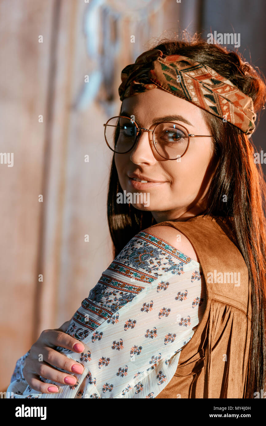 Portrait of beautiful bohemian girl in headband and glasses Stock Photo
