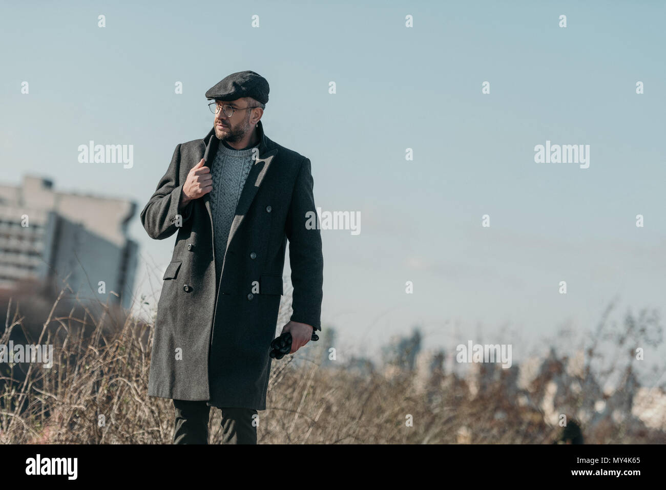 Middle aged man walking alone hi-res stock photography and images - Alamy