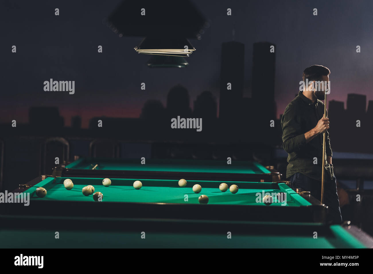 Man At Pool Table Young man standing at pool table hi-res stock photography and images ...