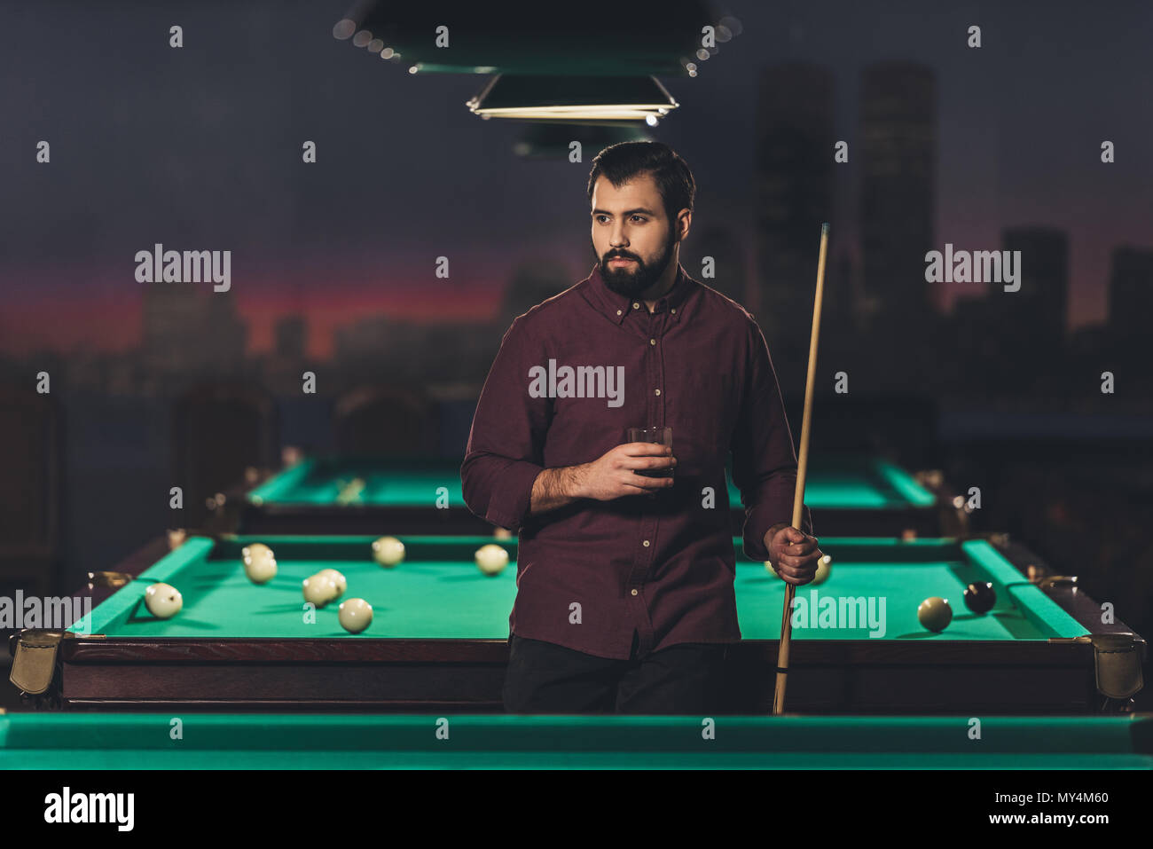 Man At Pool Table Young man standing at pool table hi-res stock photography and images ...