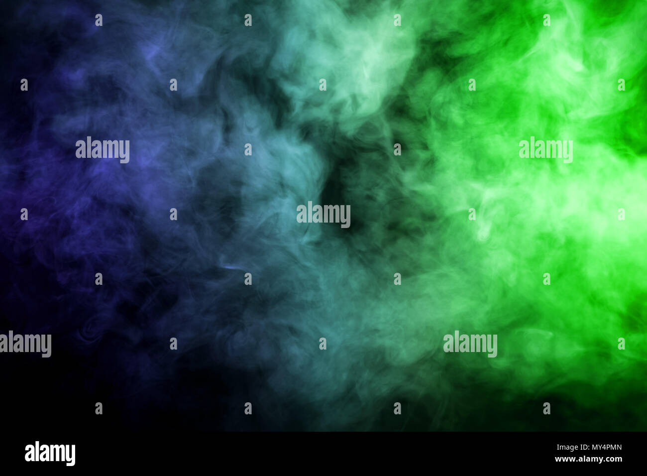 Green and blue smoke on black background Stock Photo - Alamy