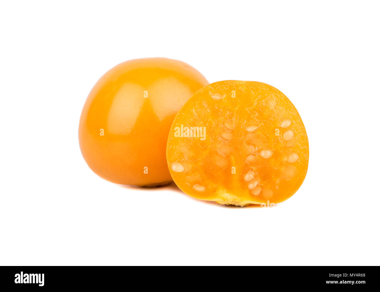 Physalis berry with juicy half on a white background Stock Photo
