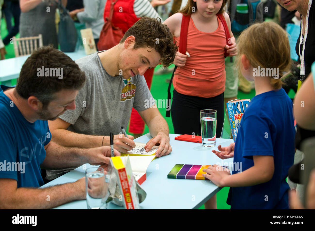 Greg James & Chris Smith book signing for fans in the bookshop at Hay Festival 2018 Hay-on-Wye Powys Wales UK Stock Photo