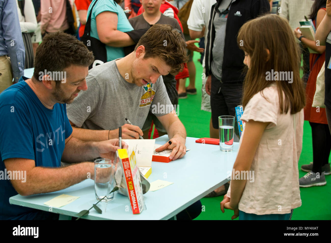 Greg James & Chris Smith book signing for fans in the bookshop at Hay Festival 2018 Hay-on-Wye Powys Wales UK Stock Photo
