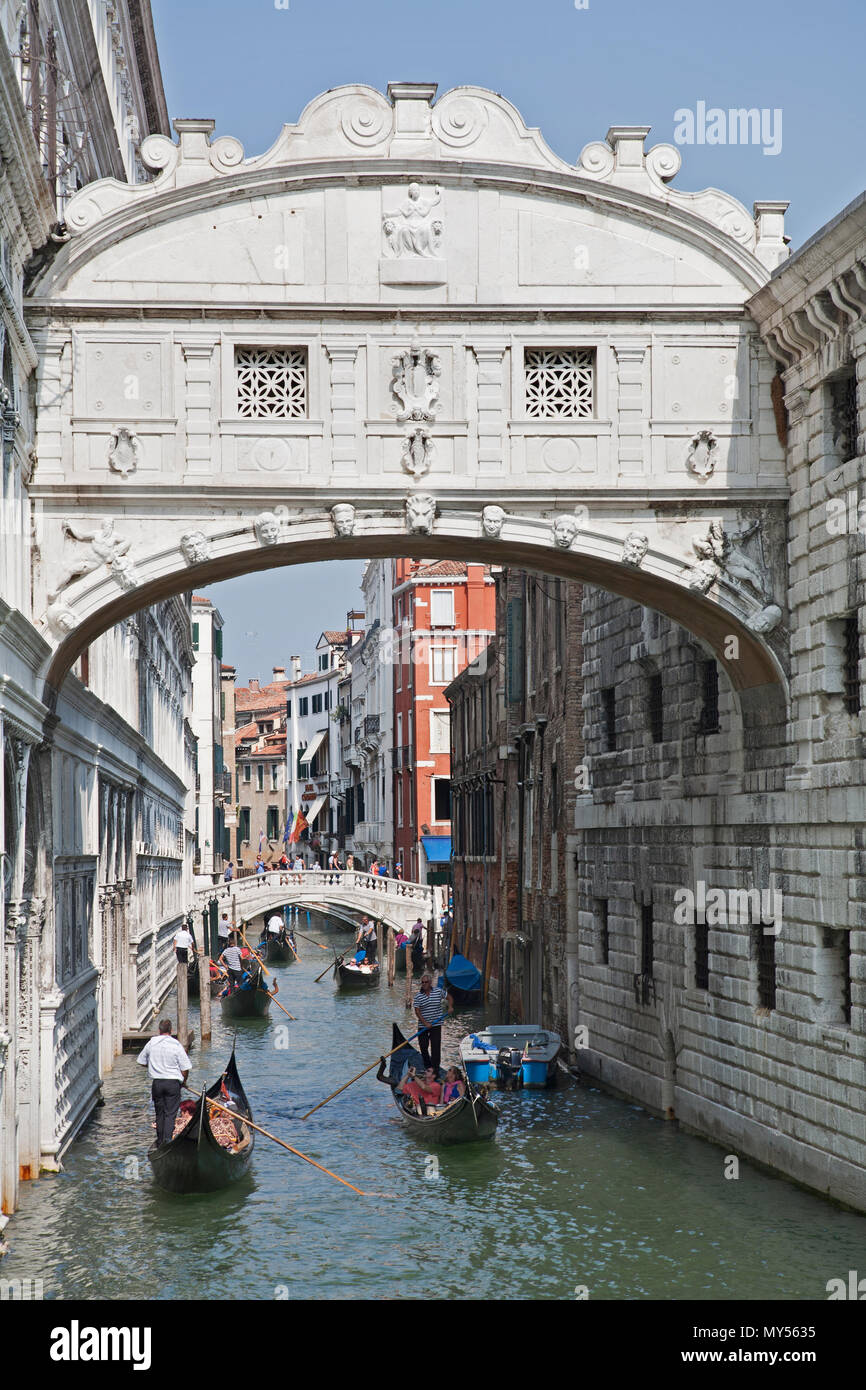 September 9, 2014: Venice, Italy- The landmark limestone Bridge of Sighs with tourists, people in gondola taxis Stock Photo