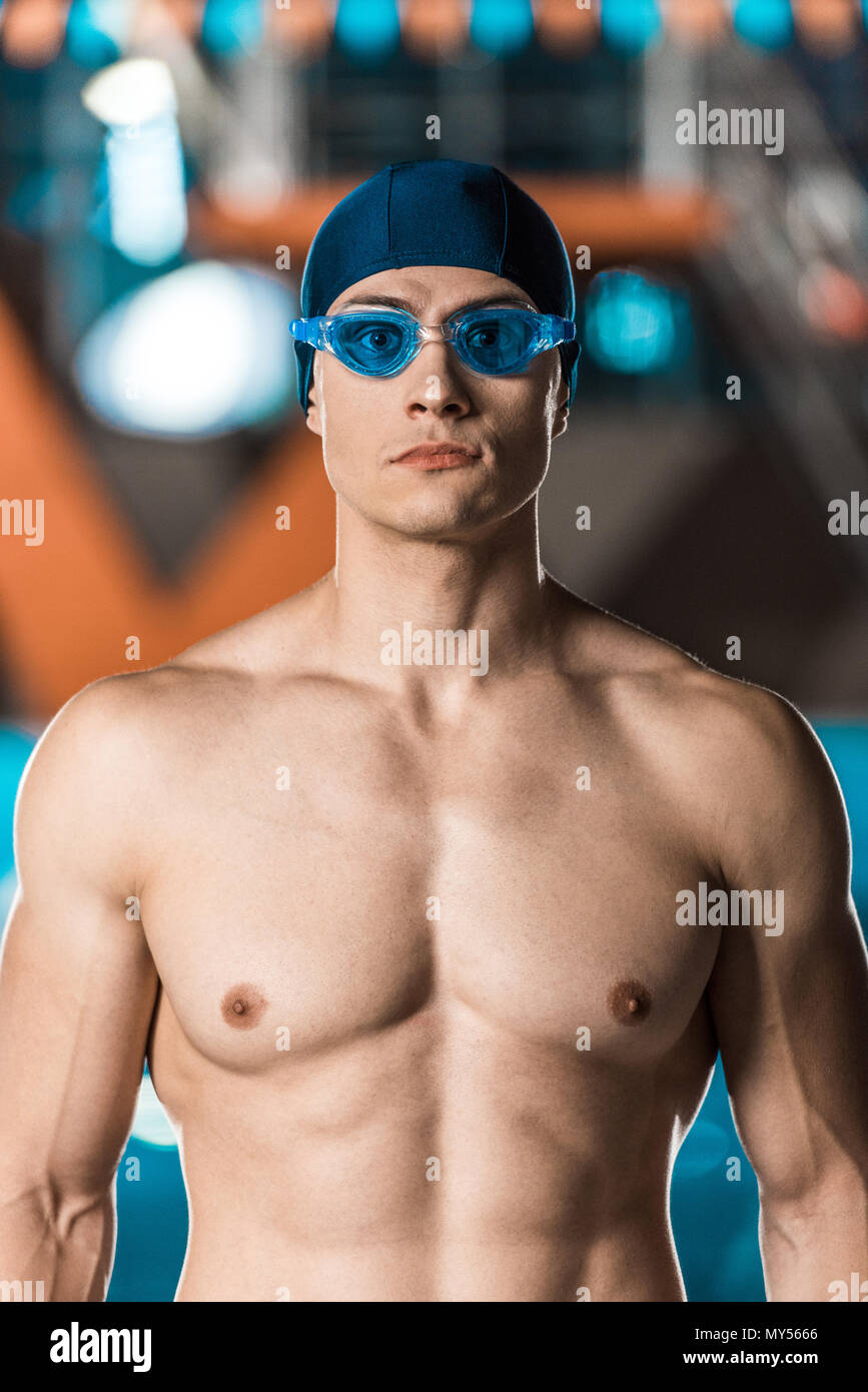 handsome muscular swimmer in swimming cap and goggles Stock Photo Alamy