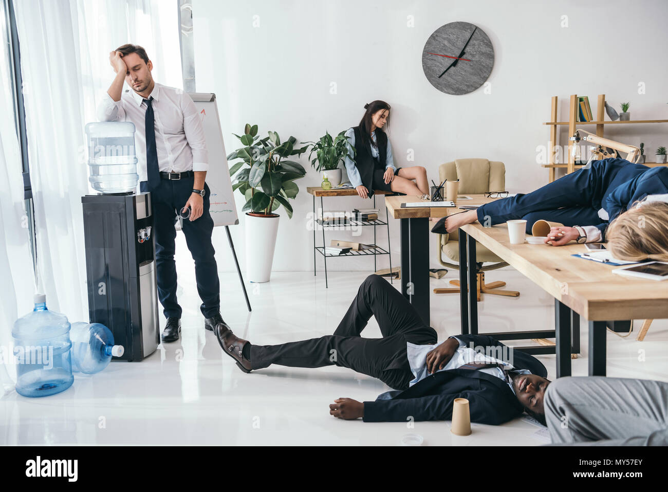 group of exhausted business partners sleeping at office Stock Photo - Alamy