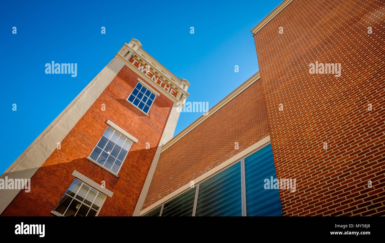 In Almelo there are two towers of an old steam mill that now is transformed to a business- and health center. 'Twenthe' is the old name of the region Stock Photo