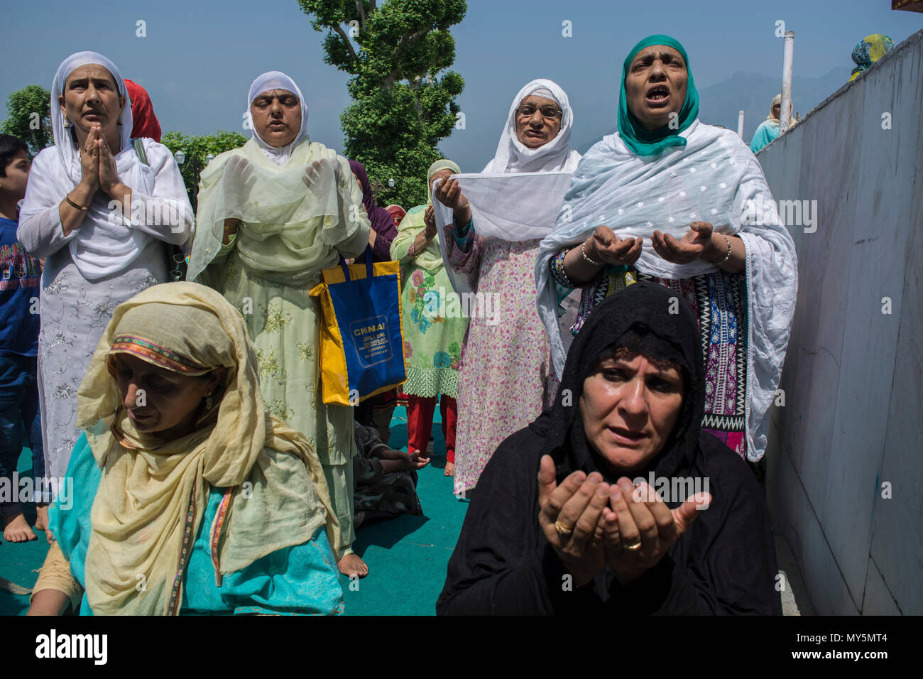 Kashmiri Muslim women devotee prays, at Hazratbal shrine to mark the ...