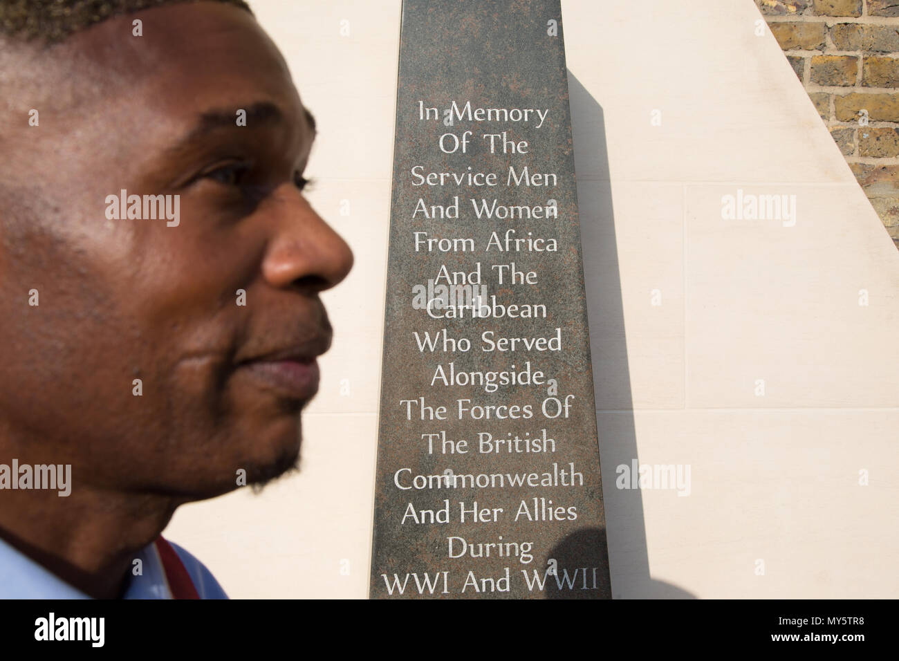London Uk 6th June 2018 Jak Beula in front of the The African and Caribbean War Memorial in Brixton during D Day Commemoration at The Black Cultural Archives in Brixton. Credit: Thabo Jaiyesimi/Alamy Live News Stock Photo