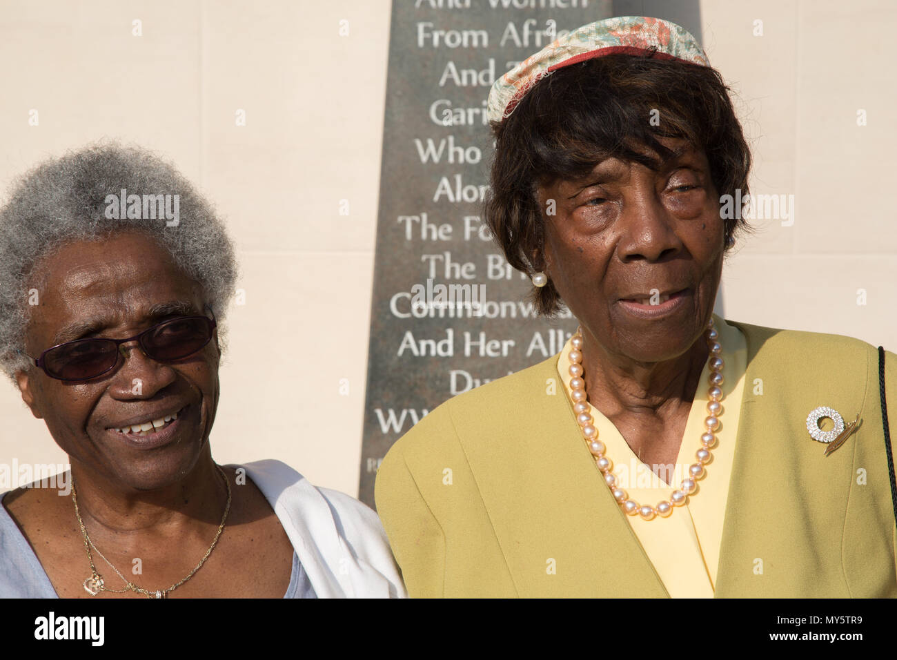 London Uk 6th June 2018 Caribbean nurses who were invited to come to Britain after World War Two, to assist with labour shortages and later became known as the 'Windrush Generation.'  in front of the The African and Caribbean War Memorial in Brixton. Credit: Thabo Jaiyesimi/Alamy Live News Stock Photo