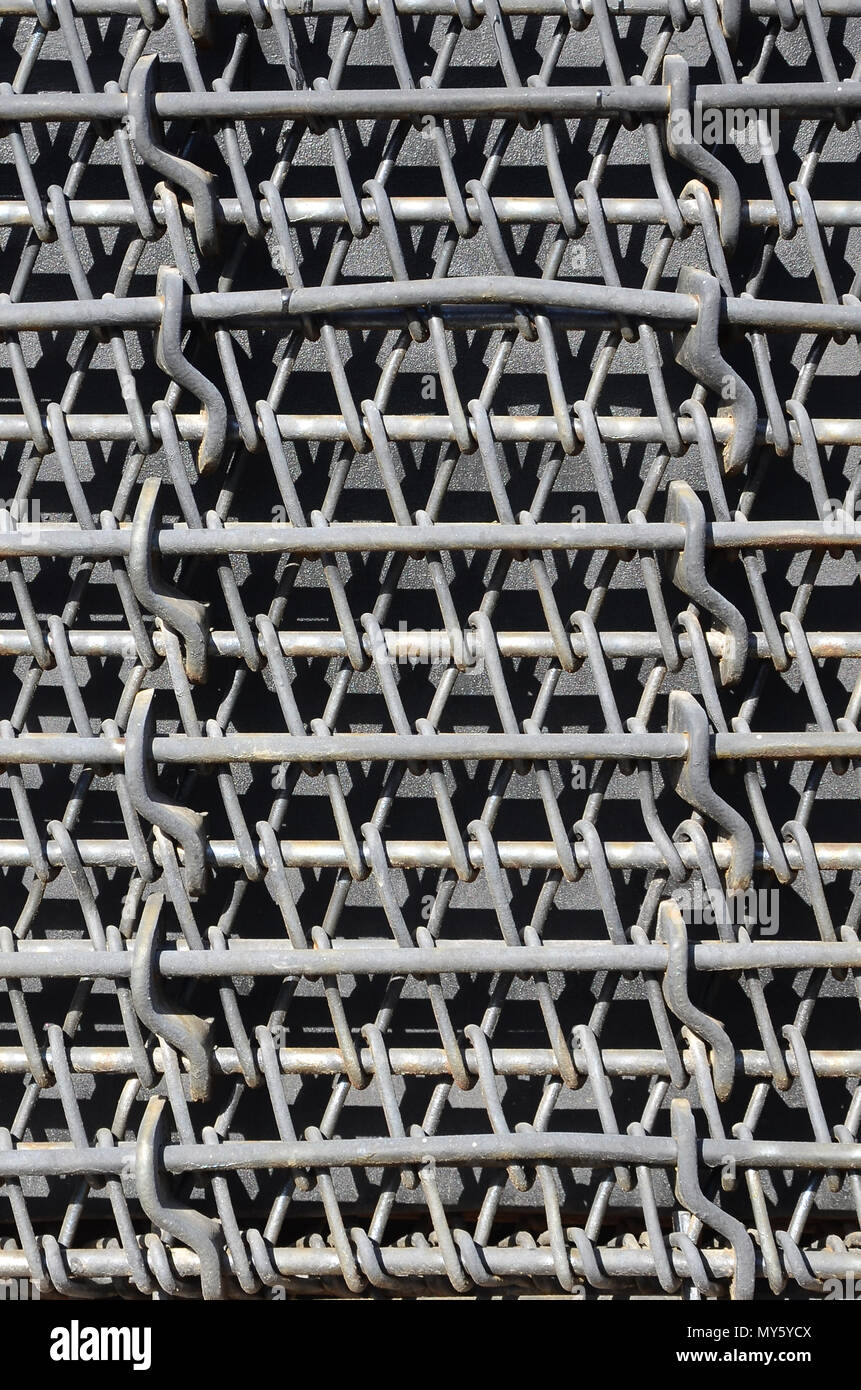 Metal multilayered thick grid of black color. Composite texture Stock Photo