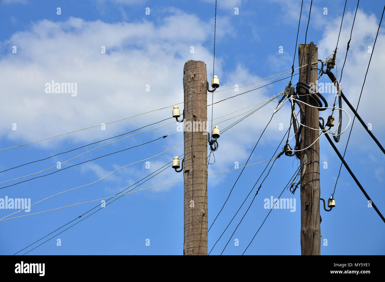 Old wooden electric pole for transmission of wired electricity on a ...