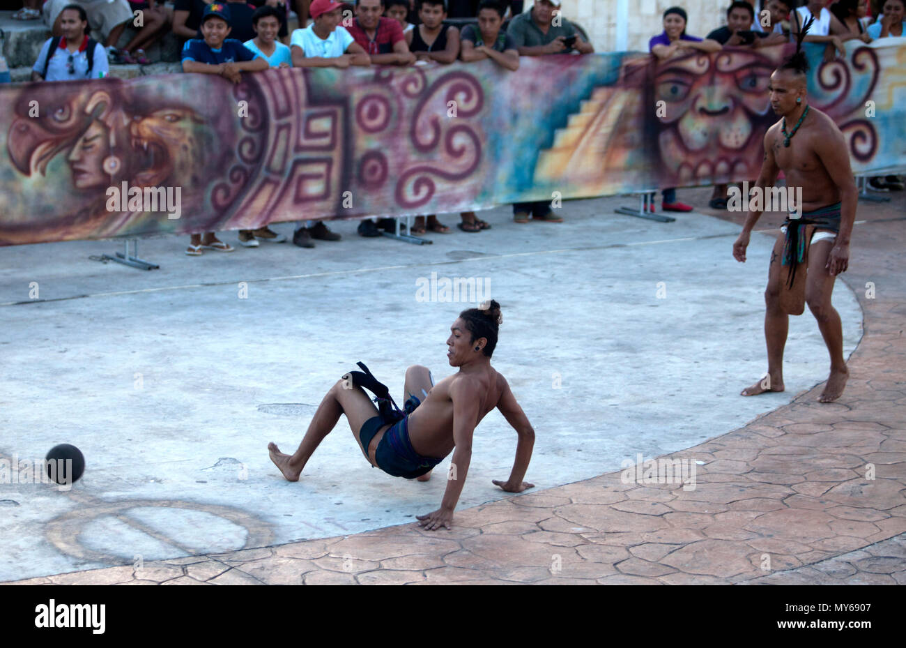 Players perfom at a Mayan Ball Game in Chichen Itza, Yucatan, Mexico Stock Photo