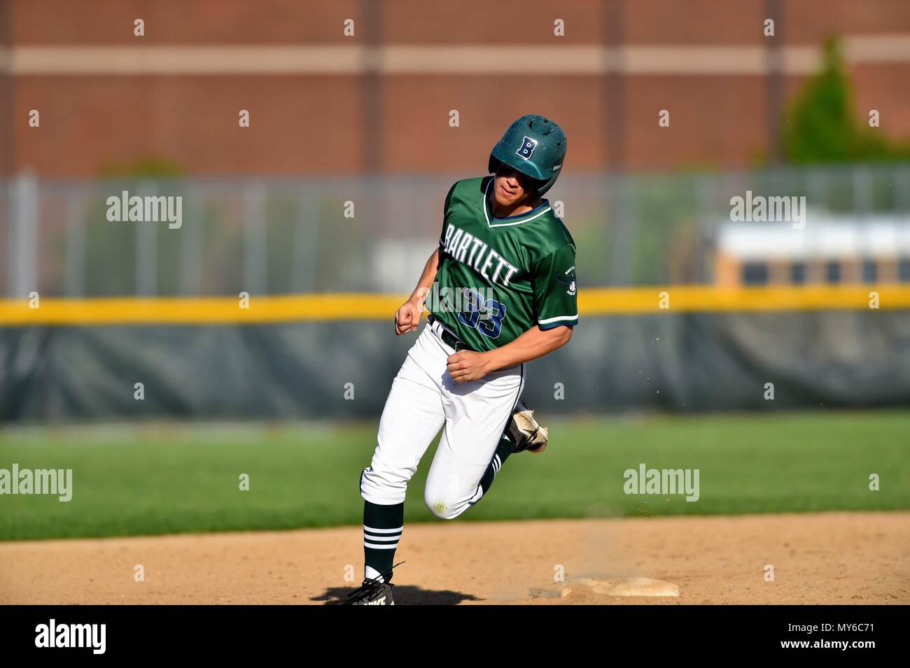 Player completing his joureny around the bases following a home run. USA. Stock Photo