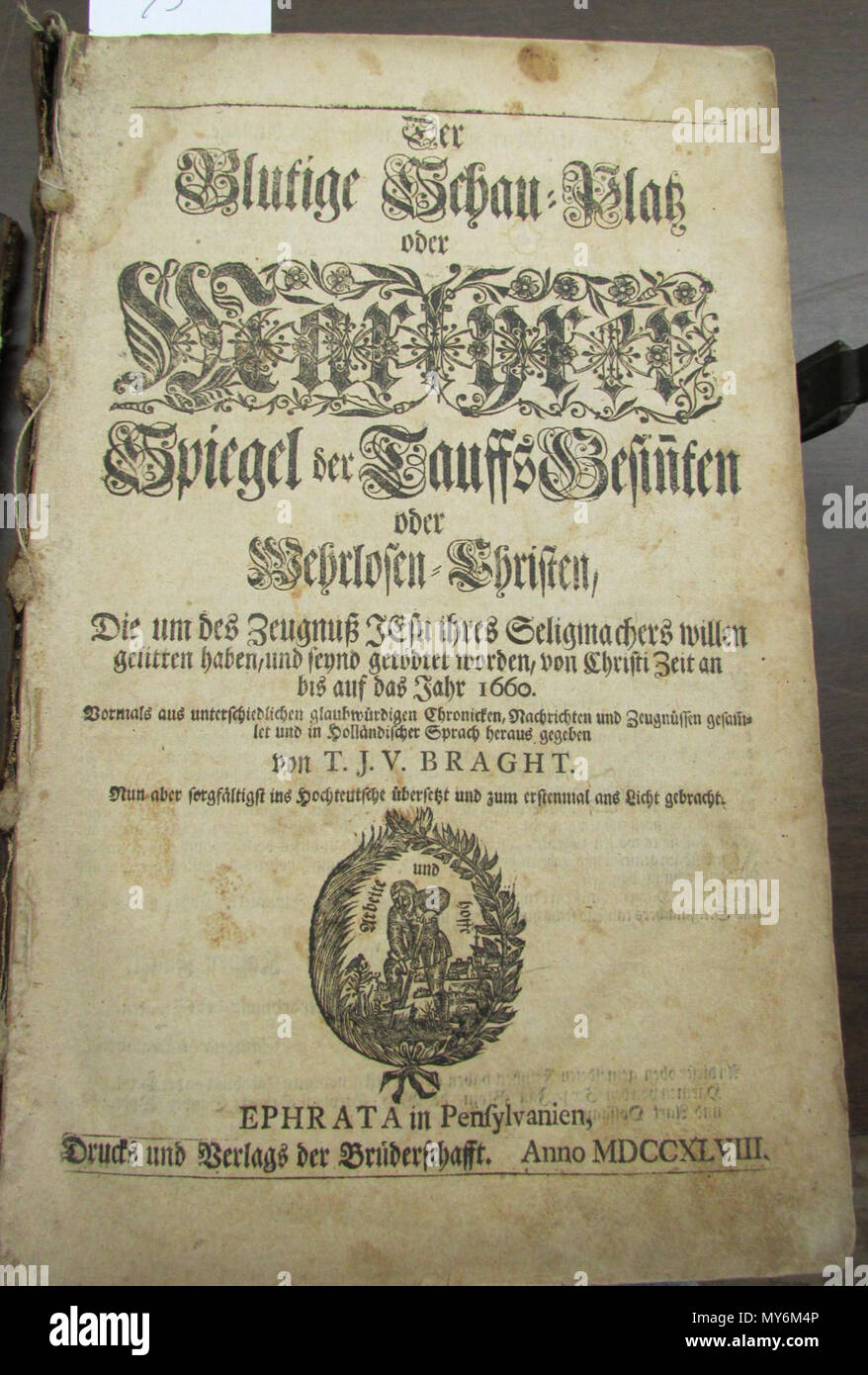 English: Martyrer Spiegel (Martyr's Mirror), German edition printed by  Ephrata in Pennsylvania in 1784. 1794. Unknown 352 Martyrer Spiegel Stock  Photo - Alamy