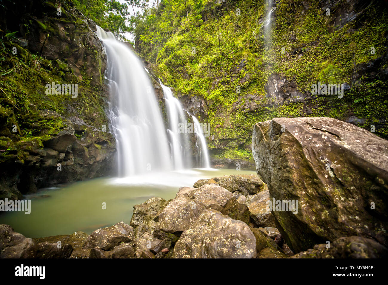 Three Bears Waterfalls / Waikani Falls on the Road to Hana in Maui, Hawaii Stock Photo