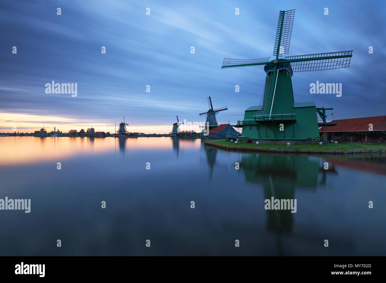 Landscape of Netherlands windmills at night Stock Photo