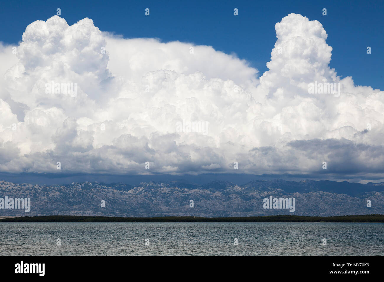 Clouds over Velebit mountain, seen from Nin, Croatia Stock Photo