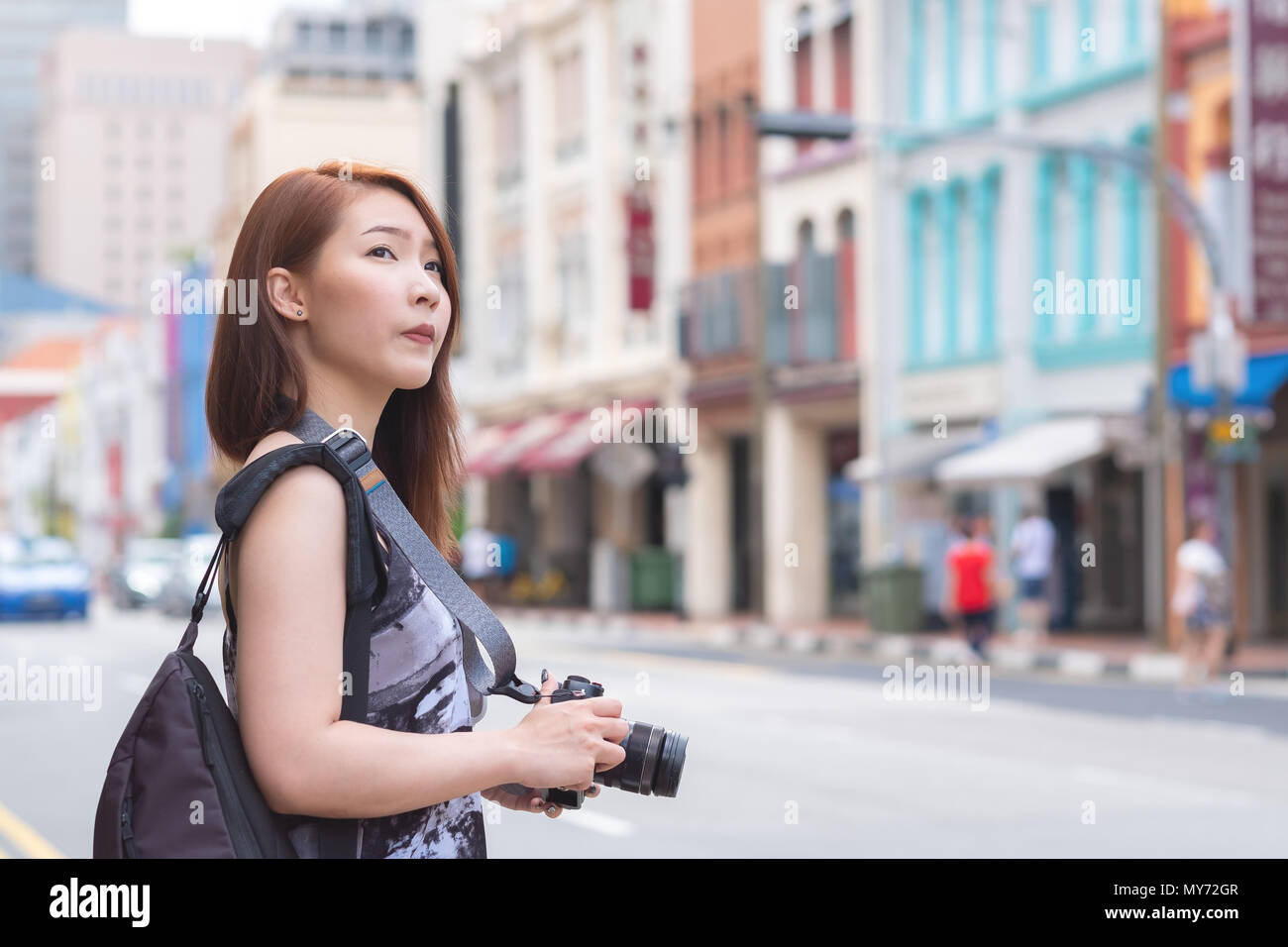 Young Asian Woman Travel In Singapore China Town Area Hand Holding