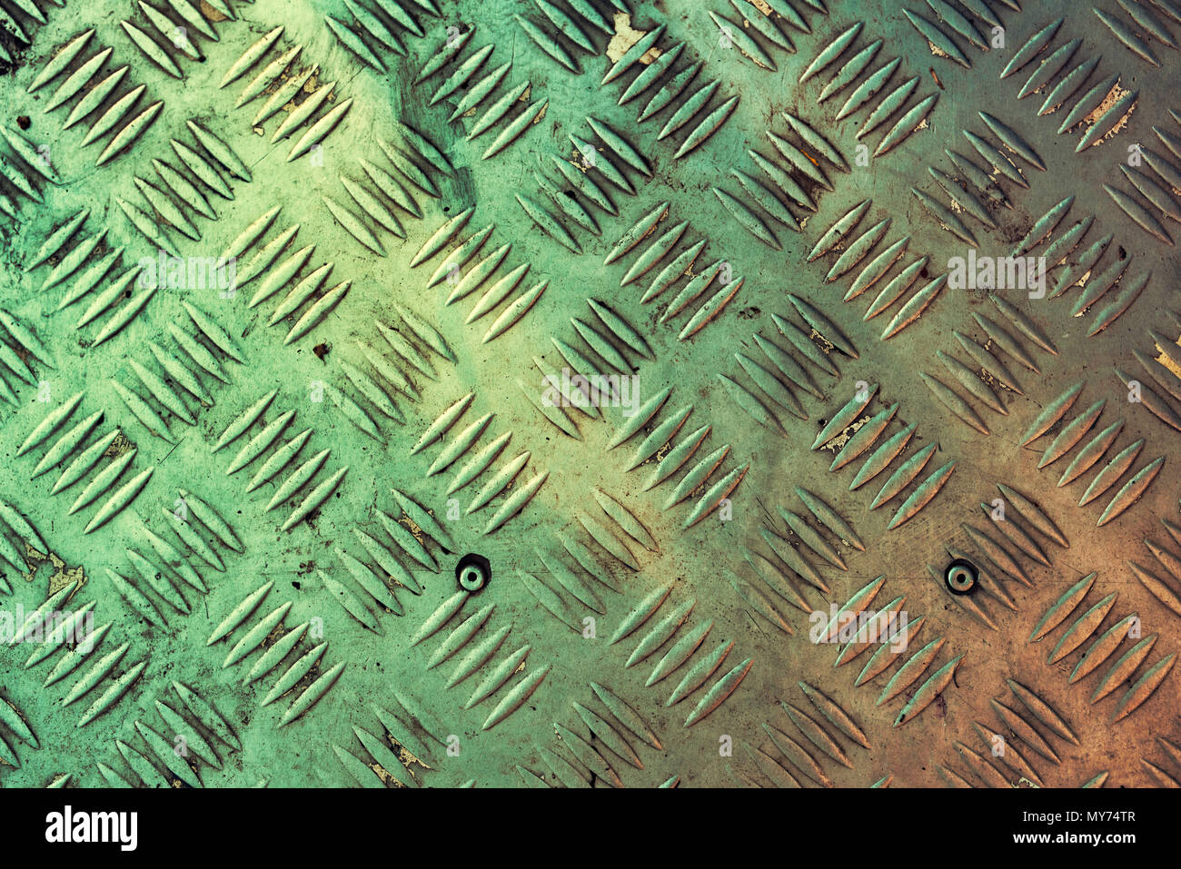 Old anti skid metal plate surface as grunge background Stock Photo