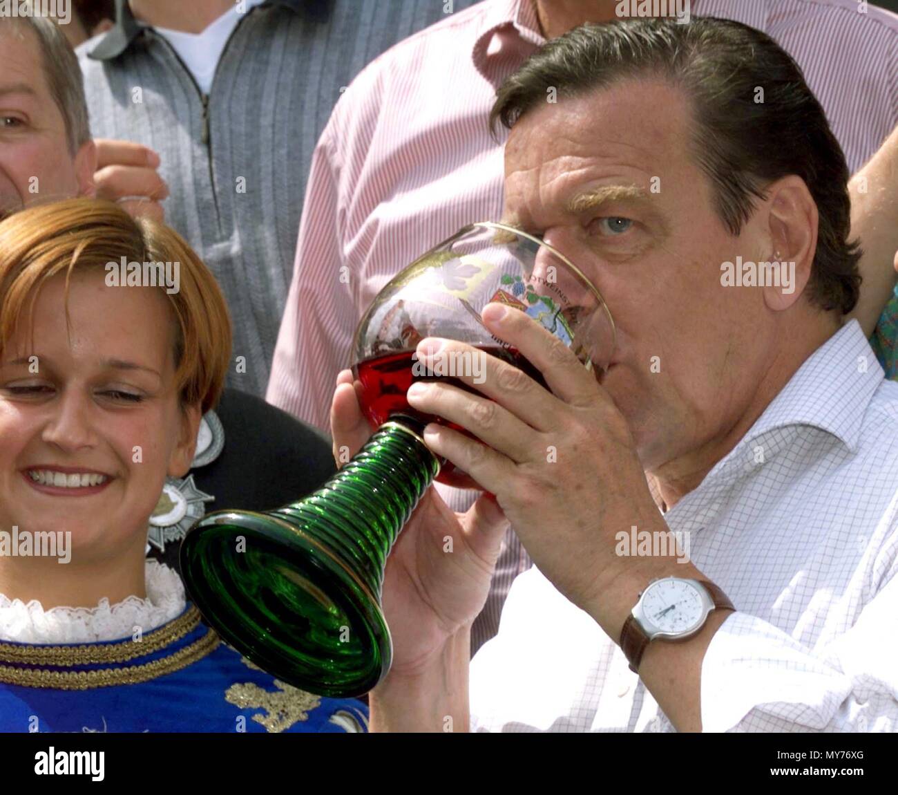 German Chancellor Gerhard Schroeder drinking a sip of wine in Unkel