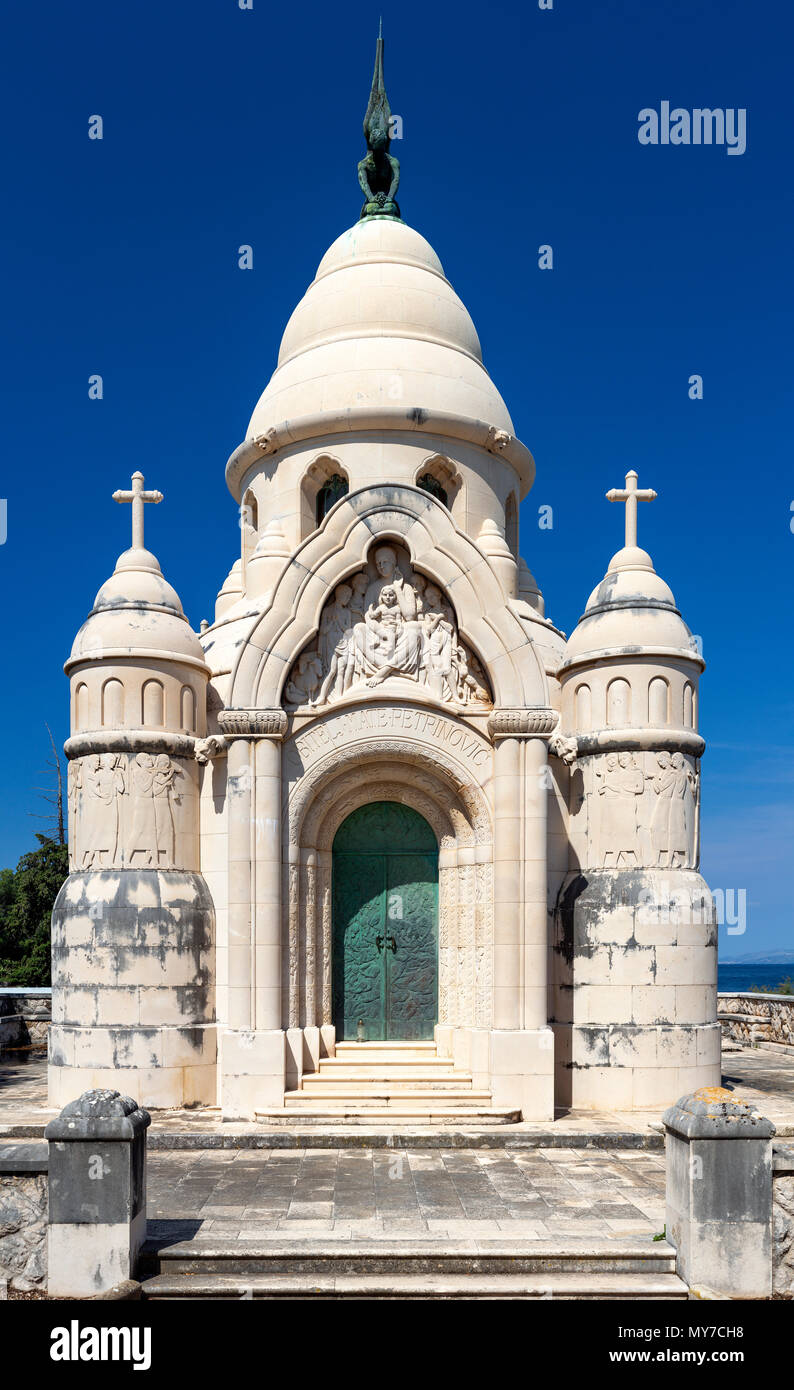 An example of use of the stone of Brac: the family Petrinović's mausoleum in the cemetery of Supetar (Comitat de Split-Dalmatie - Croatia). Stock Photo