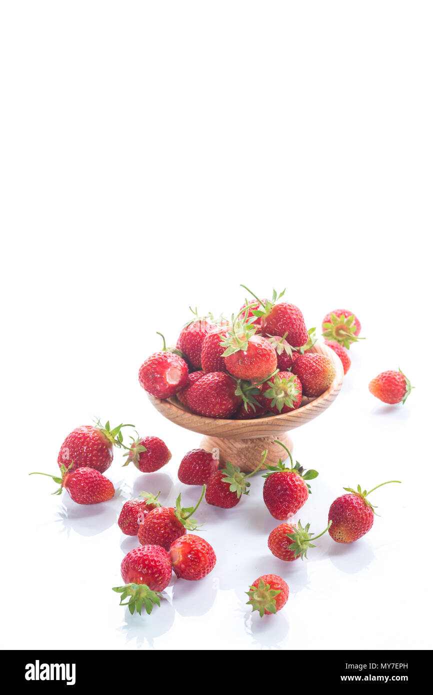 ripe red organic strawberry on a white background Stock Photo - Alamy