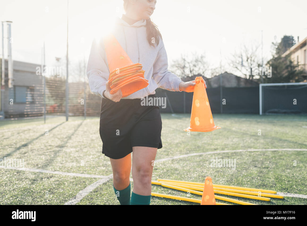 Football player preparing pitch for practice Stock Photo