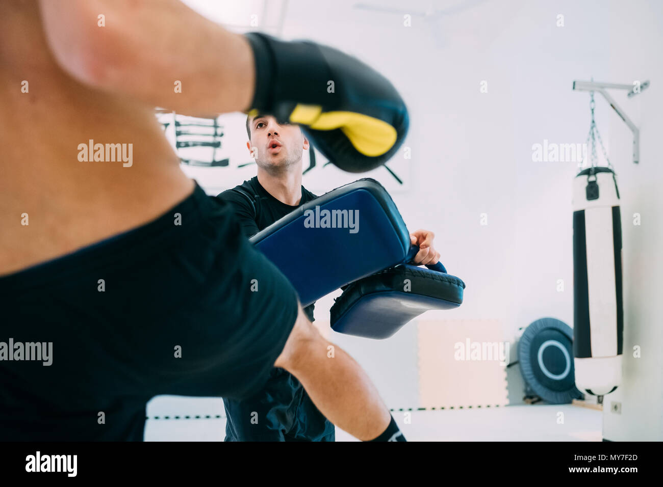 Man kickboxing training Stock Photo
