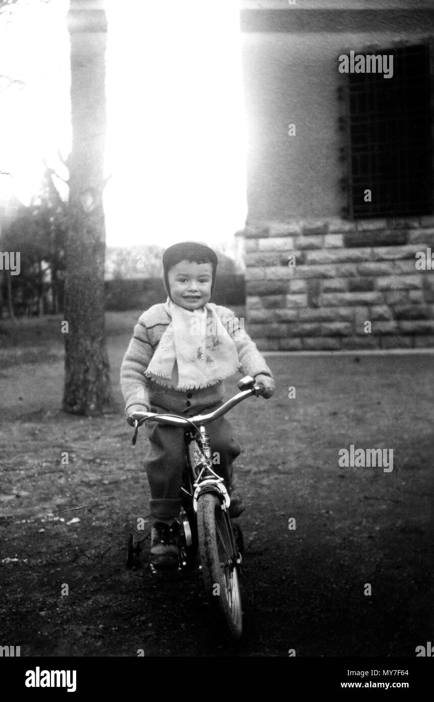 Old photograph, boy on a tricycle, France Stock Photo