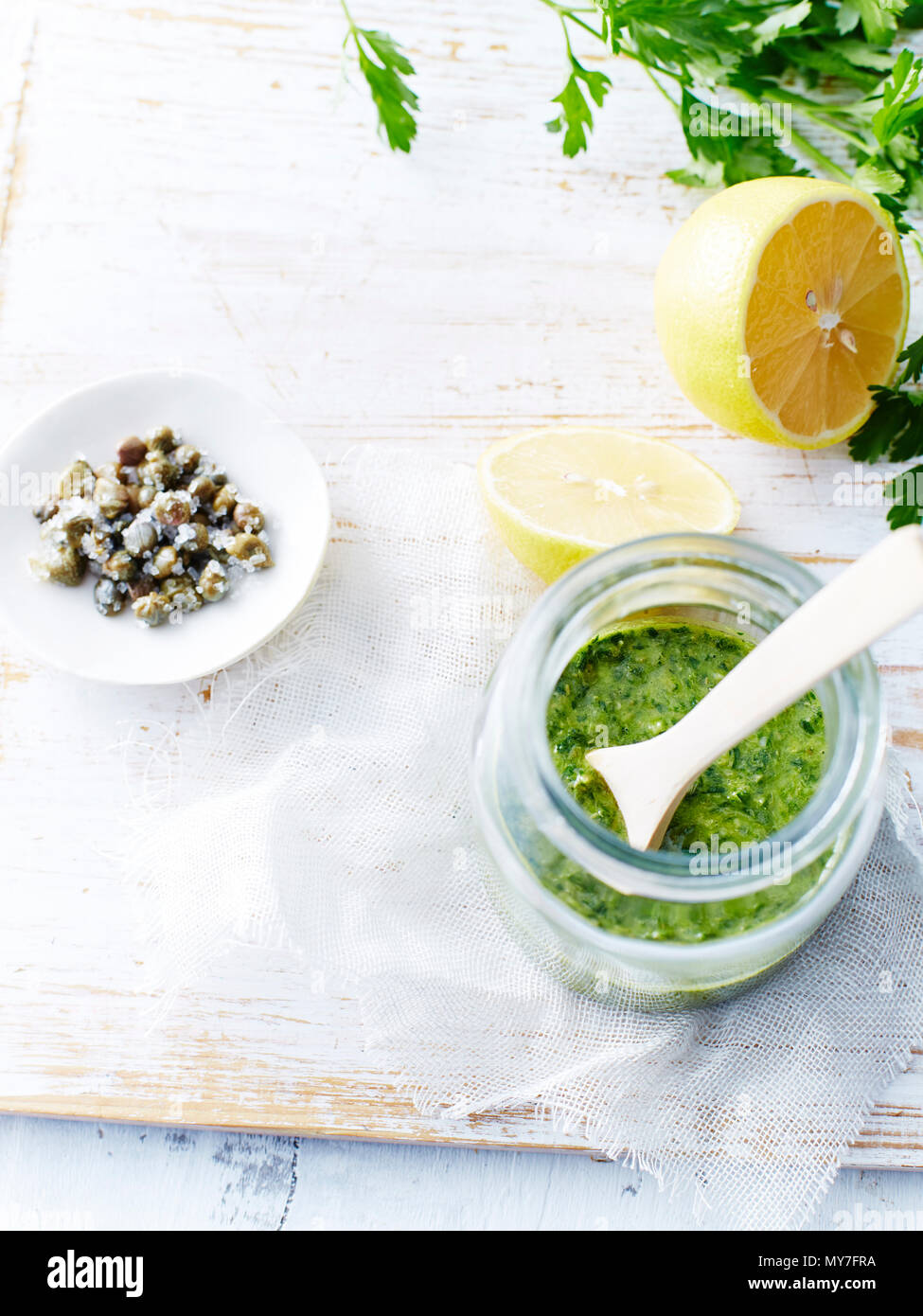 Salsa verde, capers, lemons Stock Photo Alamy