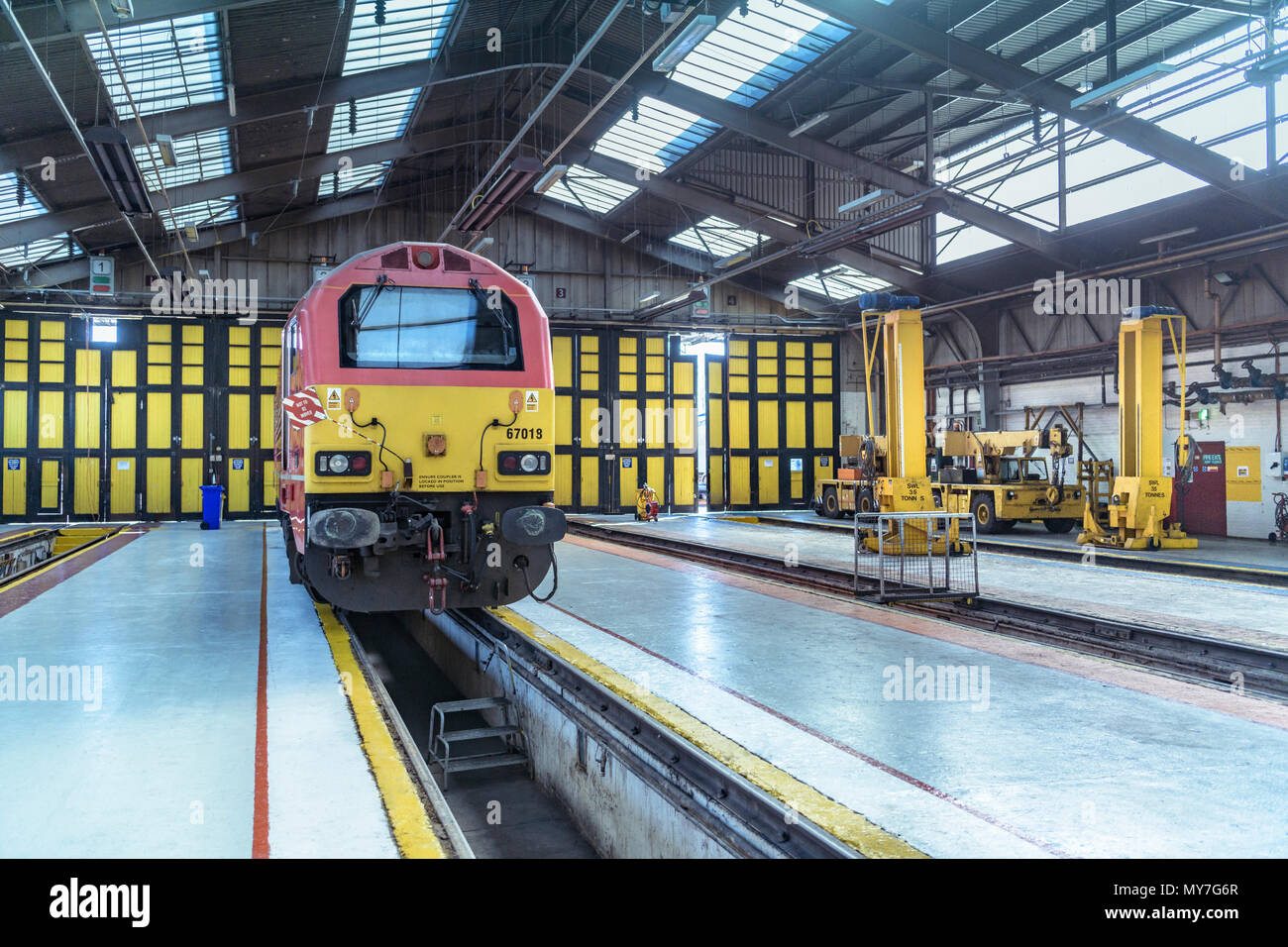 Locomotive being refurbished in train engineering factory Stock Photo